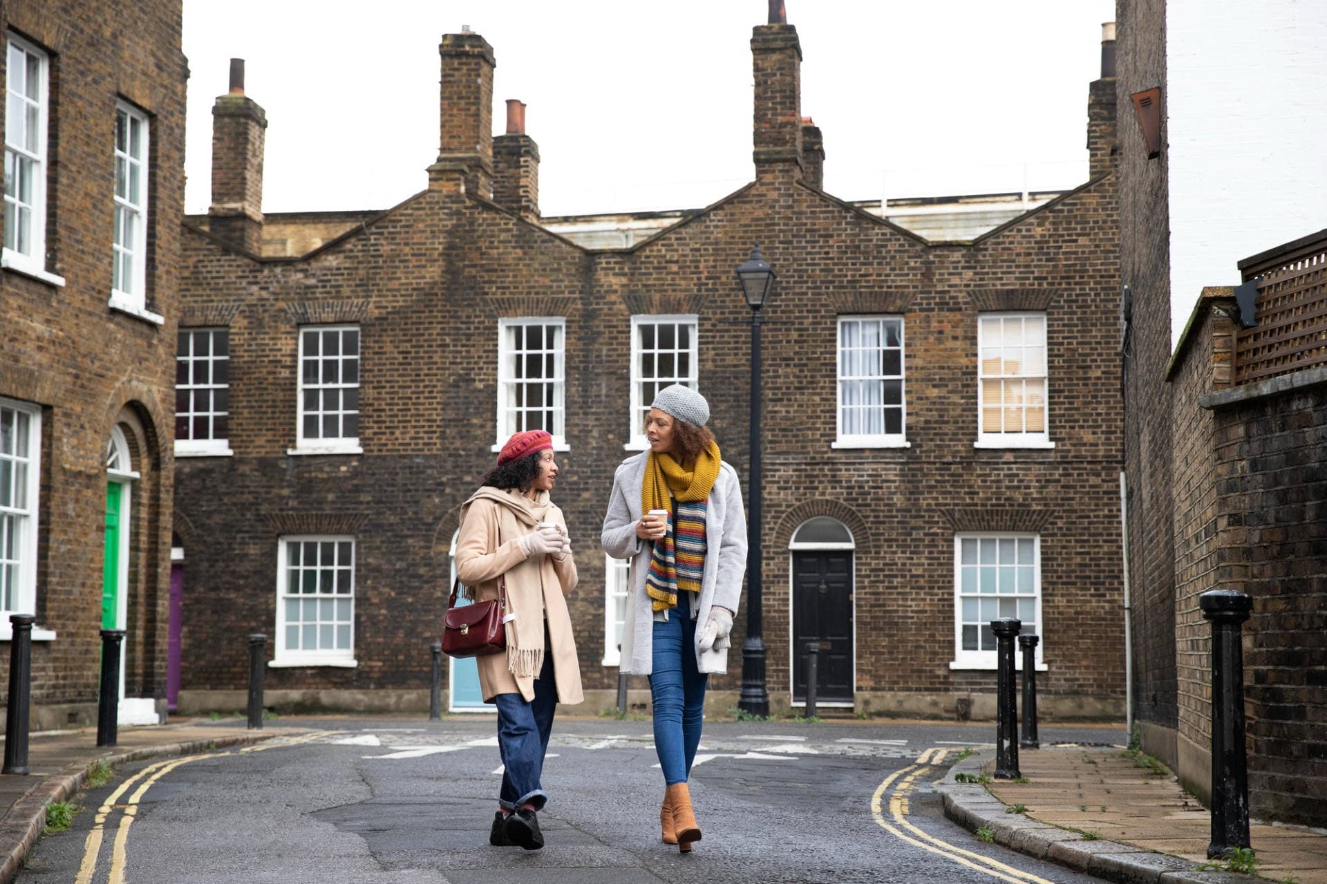 Residents and people in a UK residential setting, representing community-led block management